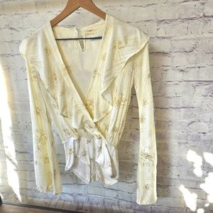 Novella Royale Gold and Cream Bodysuit with Elegant Wrap Design